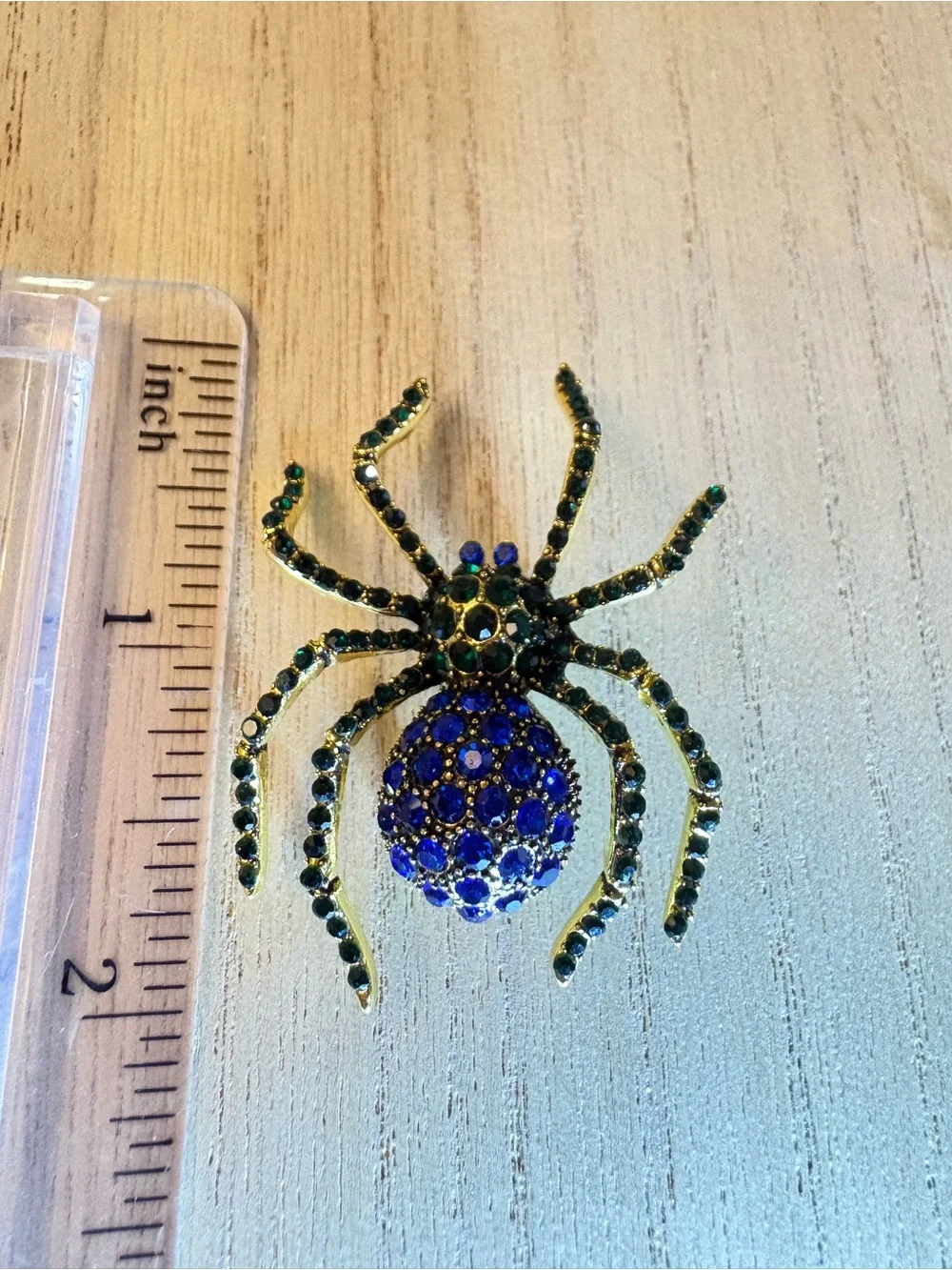 Gold-tone Spider Brooch with Blue and Green Rhinestones